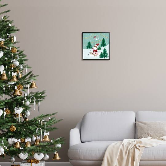 Stupell Industries Let It Snow Santa Snowshoeing Framed Giclee Art
